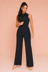 Ermeløs jumpsuit med sløyfe