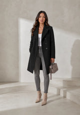 Manteau long ceinturé à col tailleur
