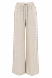 Pantalon large beige à coquillages | Lounelle Paris