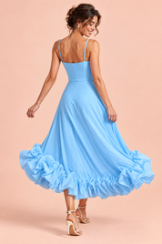 Robe midi bleu ciel évasée à bas volanté | Vue de dos | Lounelle Paris
