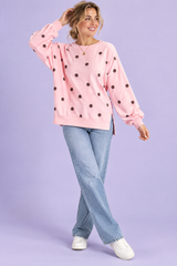 Rosa oversized genser med prikker