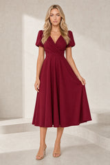 Robe col V croisé manches bouffantes