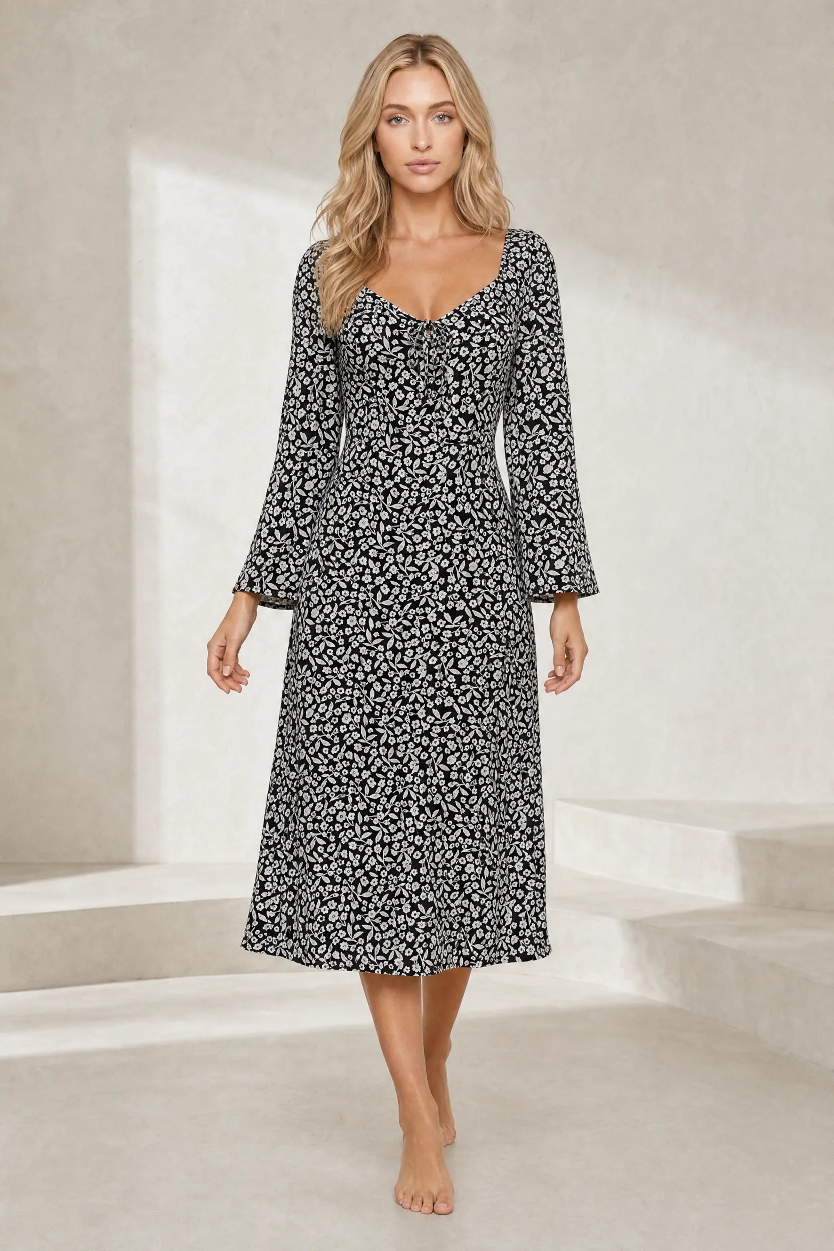 Robe noire à fleurs dos ouvert | Lounelle Paris